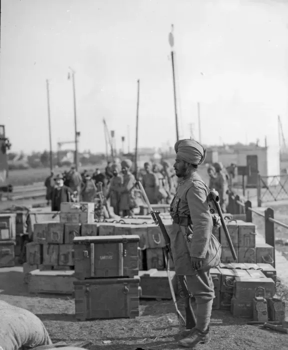 Framed Print : Sentry from the 3rd Lahore Indian Division seen here guarding ammunition boxes at their