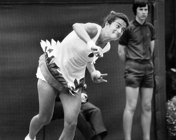 How to serve without a raquet. Virginia Wade loses her raquet with this serve. P009628