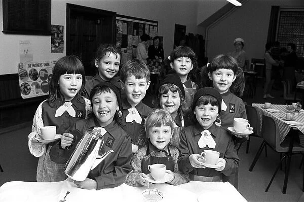 Service with a smile... pouring out the coffees are these Slaithwaite Brownies who raised