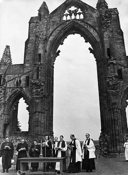A service takes place at Guisborough Priory. 18th May 1975