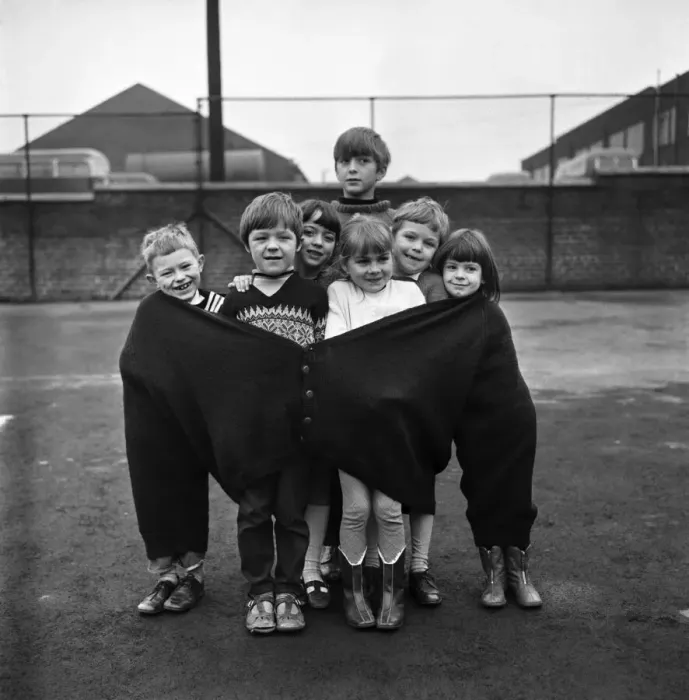 Framed Print : The seven children in the fat mans pullover are (left to right Framed Print : The seven children in the fat mans pullover are (left to right