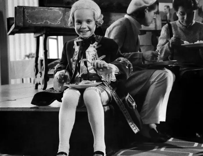 Framed Print : Seven year old Jeremy Atkin played some of Mozarts early works at a festival hall