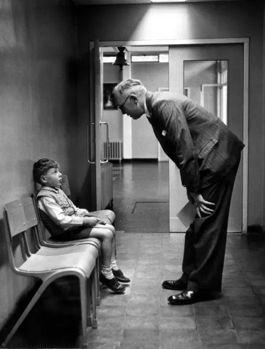 Framed Print : Seven year old Richard Colman meets the headmaster Mr Hart at South Mead Primary school Framed Print : Seven year old Richard Colman meets the headmaster Mr Hart at South Mead Primary school
