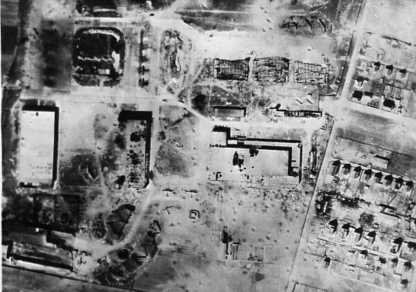Severe damage to important buildings is shown in this reconnaissance picture after