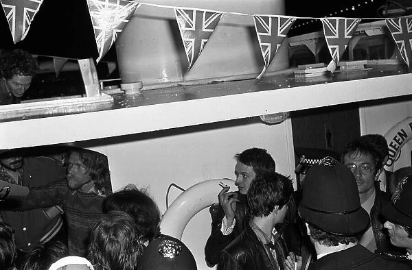 Sex Pistols Jubilee boat party on the Thames. Pictured, guests after the police forced