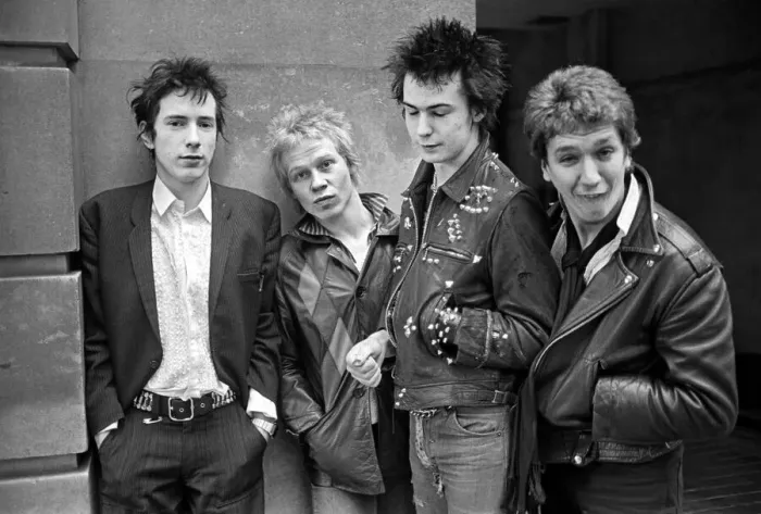 Framed Print : Sex Pistols punk rock band seen here in a London Circa 1st May 1977 Left is