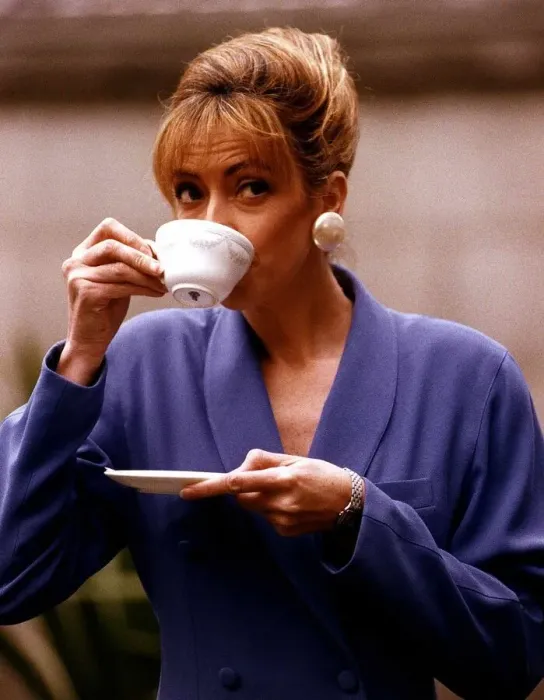 Framed Print : Sharon Maughan actress drinking a cup of coffee during recording of an advert for Gold Framed Print : Sharon Maughan actress drinking a cup of coffee during recording of an advert for Gold
