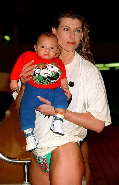 Sharron Davies Swimmer TV Presenter with baby January 1994 A©mirrorpix