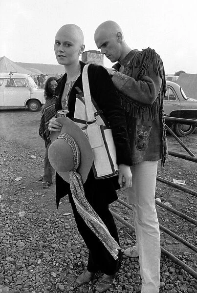 Shaven headed couple at The Isle of Wight Pop Festival. 30th August 1970