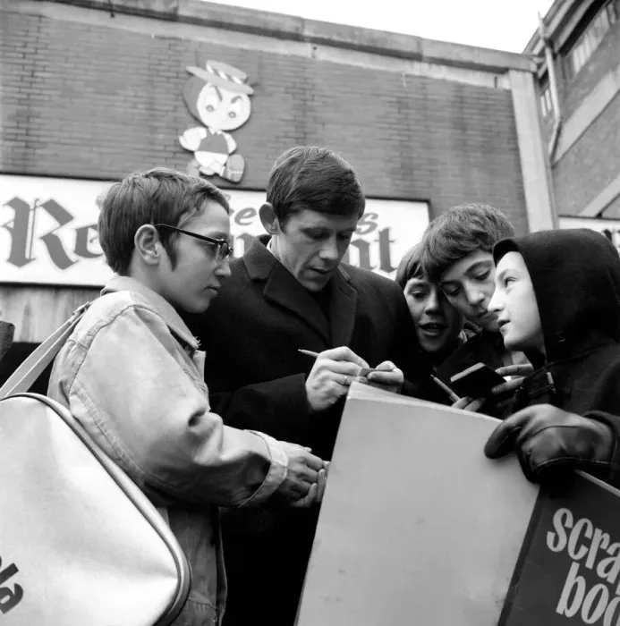 Framed Print : Sheffield Wednesday football player Jackie Sinclair signs autographs for fans at a local Framed Print : Sheffield Wednesday football player Jackie Sinclair signs autographs for fans at a local