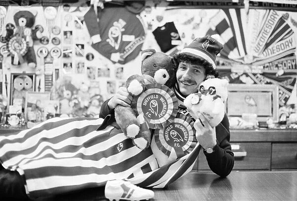 Sheffield Wednesday footballer Terry Curran decked out in the teams rosettes