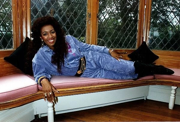 Sheila Ferguson singer lying on window seat
