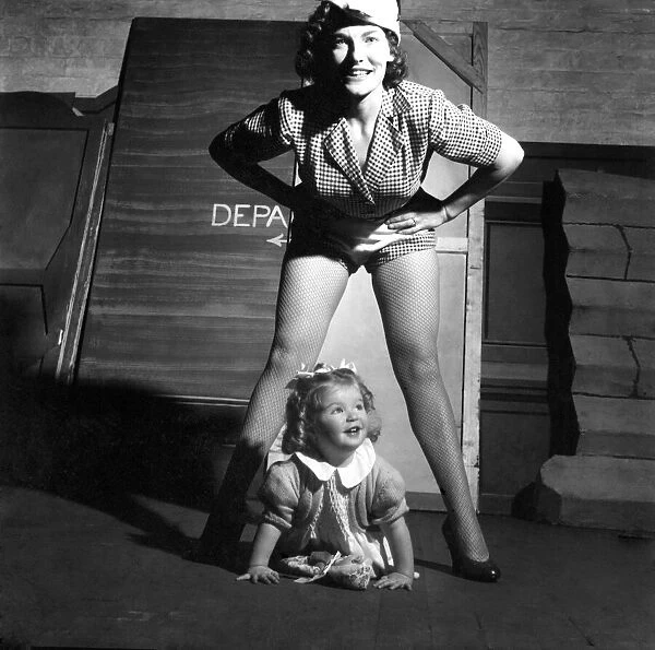 Sheila Hannaway, principal boy in Dick Whittington at Glasgow with her 2 year old