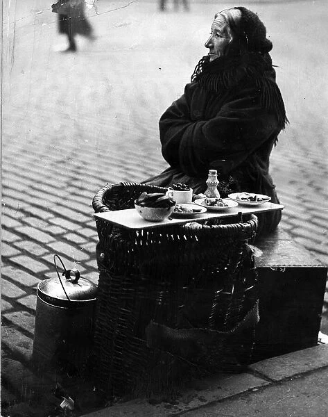 Shell fish vendor, April 1924 Lawnmarket, Edinburgh Woman sitting