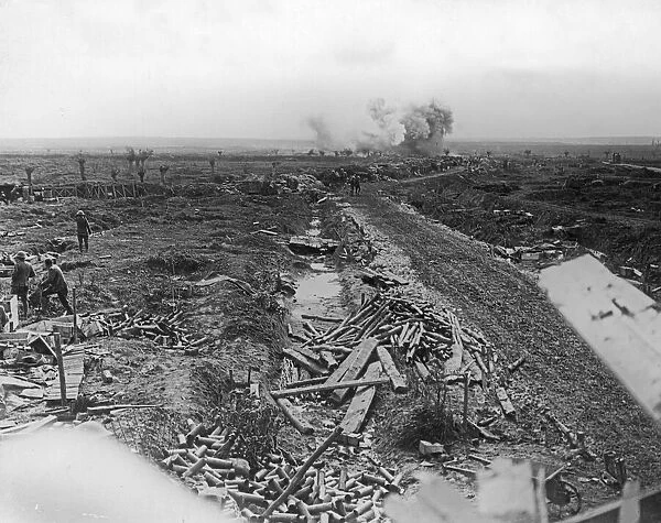 Shells bursting in the distance on newly captured ground taken from the main road to