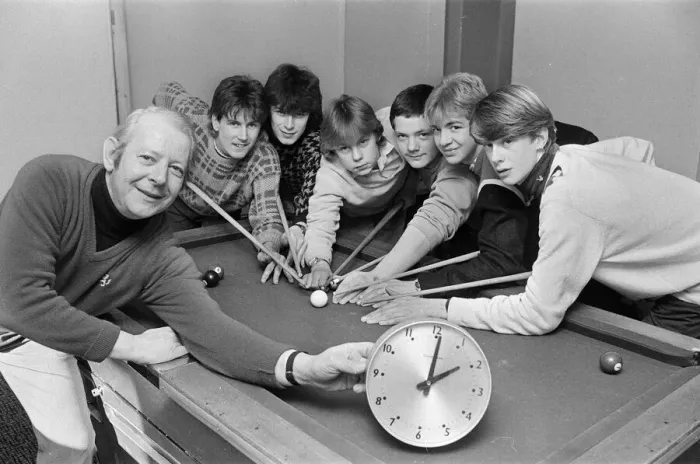 Framed Print : Shepley Youth Club leader Stewart Hughes kept an eye on the clock as club members took Framed Print : Shepley Youth Club leader Stewart Hughes kept an eye on the clock as club members took