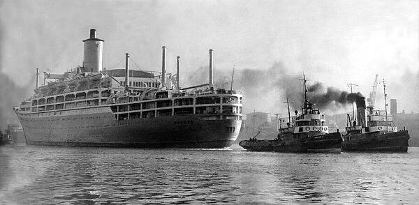Ship, the Orient liner Orsova being towed up the River Tyne, stern first