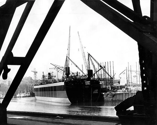 A ship undergoes surgery at a shipyard in the North East. Circa 1960