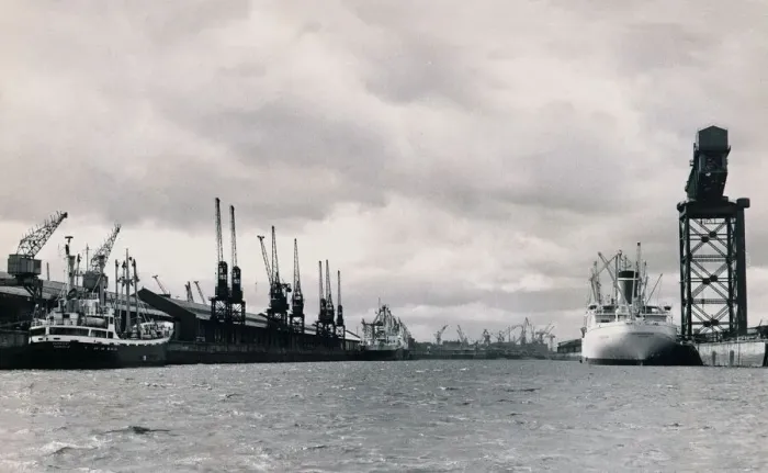 Framed Print : A shipping dock yard with cranes, and already docked are The New Zealand Star London
