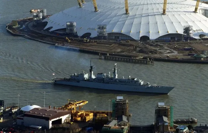 Framed Print : Ships HMS London sails past the Millennium Dome Jan 1999 to her final mooring place