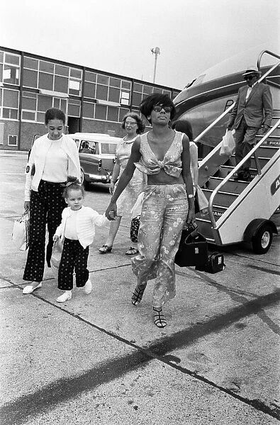 Shirley Bassey arrived at London Airport from Nice with her two children, Sharon