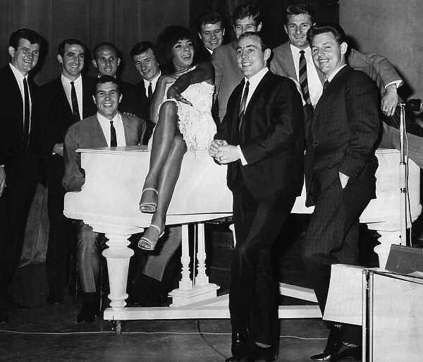 Shirley Bassey giving a farewell song to Liverpool football players on the evening of