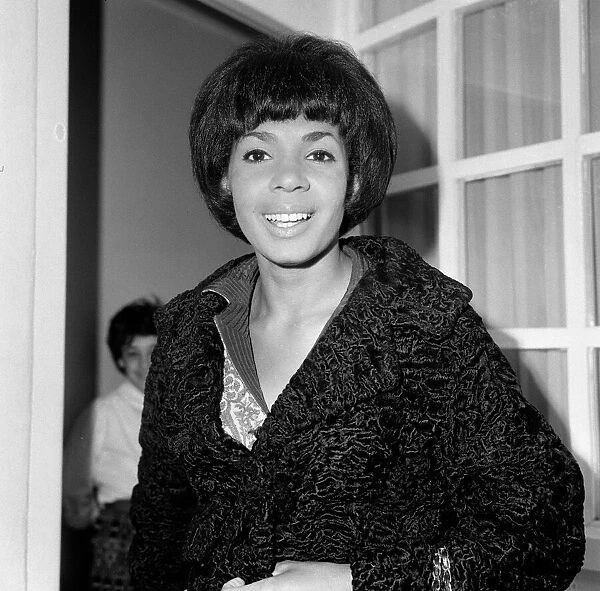 Shirley Bassey pictured in her flat in Victoria, London. 20th May 1964