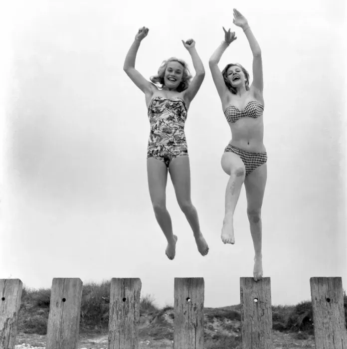 Framed Print : Shirley Eaton and Shirley Burniston seen here modelling a bikini and all in one Swim suit Framed Print : Shirley Eaton and Shirley Burniston seen here modelling a bikini and all in one Swim suit