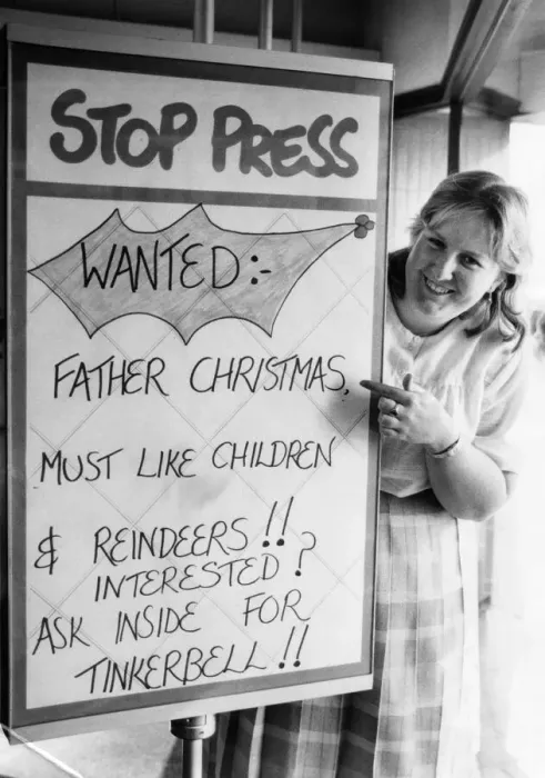 Framed Print : Shirley Jeffrey from Lord Street Job Centre with the Santa wanted sign Framed Print : Shirley Jeffrey from Lord Street Job Centre with the Santa wanted sign