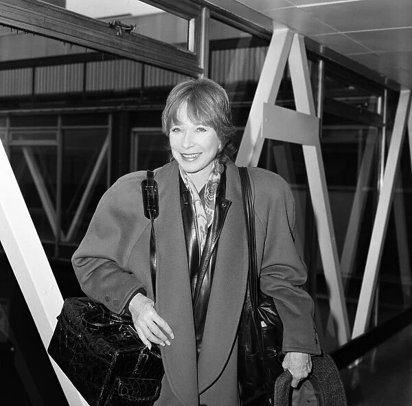 Shirley MacLaine leaving Heathrow Airport. 29th October 1985