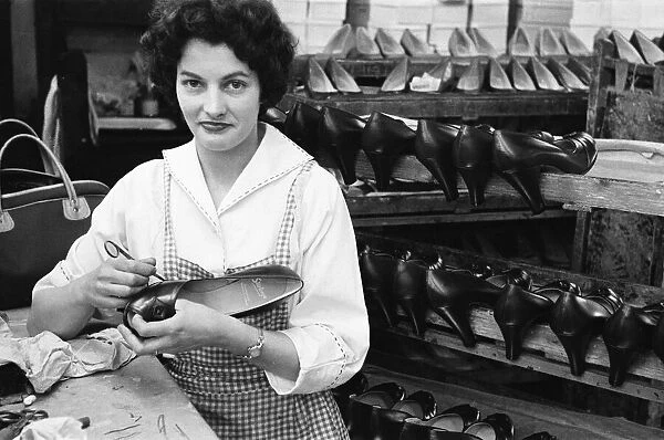 Shoes being finished and trimmed at the H Solomons shoe factory in Tottenham
