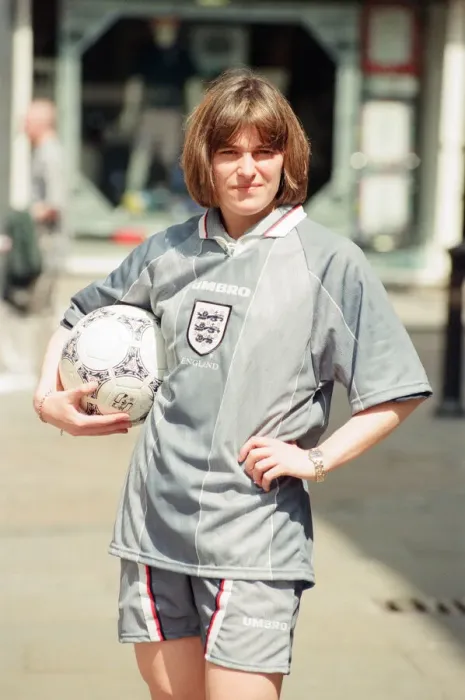 Framed Print : Shop asistant Karen Burke from Soccer City, models Englands Grey Strip, Liverpool Framed Print : Shop asistant Karen Burke from Soccer City, models Englands Grey Strip, Liverpool