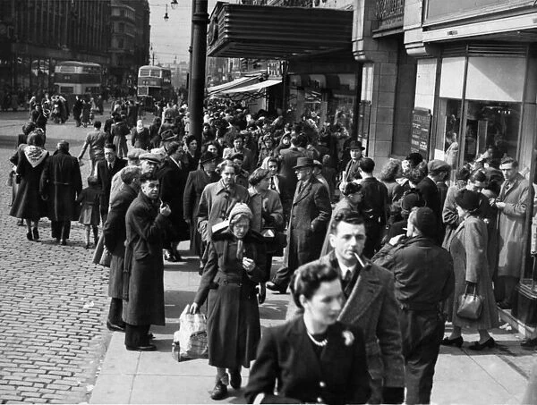 Shopper out and about on Market Street, Manchester 15th April 1950