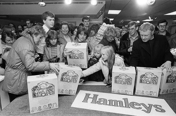 Shoppers buying Cabbage Patch Dolls at Hamleys, London toy store. 3rd December 1983