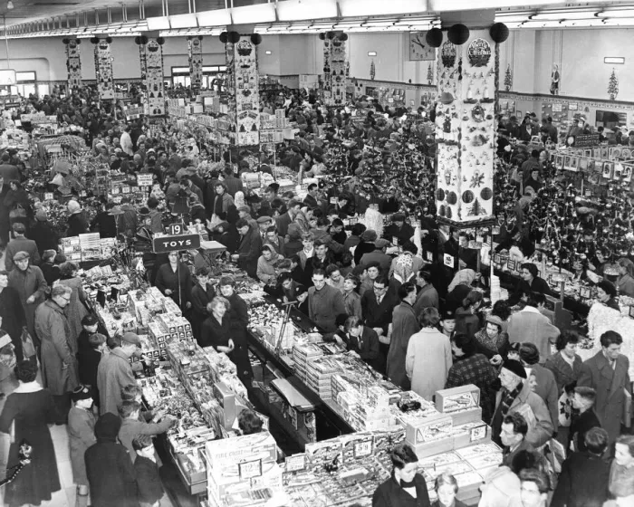 Framed Print : Shoppers looking for bargain Christmas presents at Woolworths store, Market Way