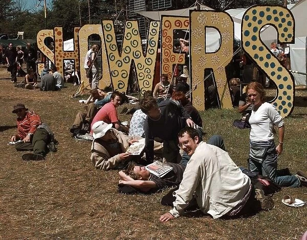 The showers at the Glastonbury Festival 1999 as fans relax in the sunshine