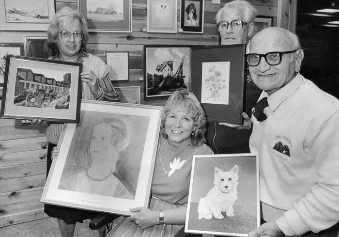 Framed Print : Showing their paintings are some of the contributors to an art exhibition Framed Print : Showing their paintings are some of the contributors to an art exhibition