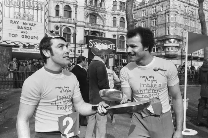 Framed Print : Shrove Tuesday Pancake Racing took place in Leicester Square today