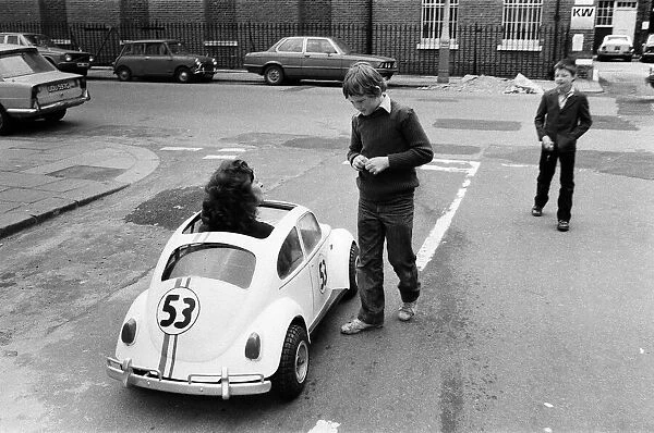 Sian Lloyd, who works at Walt Disney Productions, driving a replica of Herbie in Primrose
