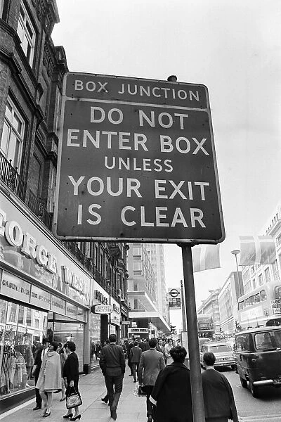 Sign warning drivers of a box junction ahead in rin Oxford Street London
