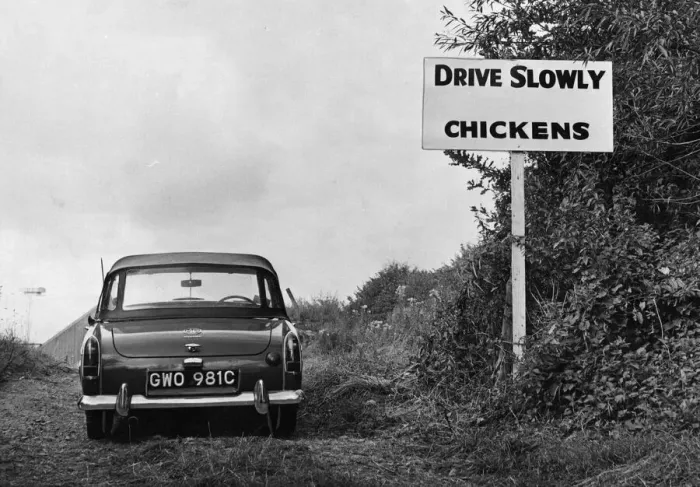 Framed Print : A sign warning motorists leaving the Monmouthshire show that they will drive through a