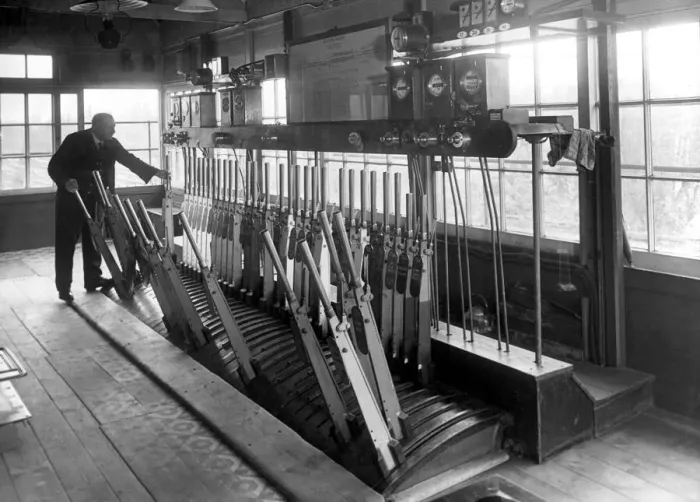 Framed Print : Signalman at work in his Signalbox. c. 1950 P044400 English Railways