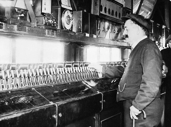 A signalman at work at Snow Hill railway station in Birmingham, June 1932