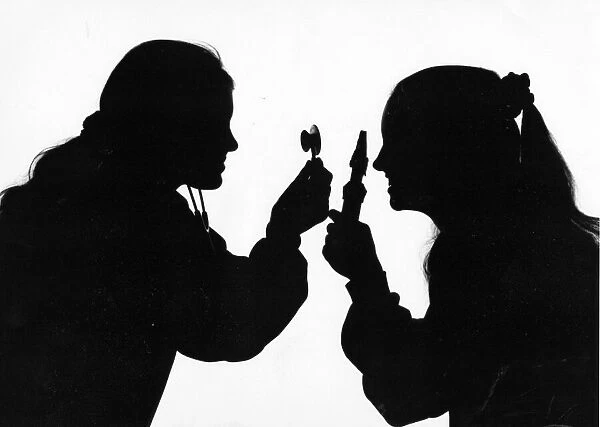 A silhouette of medical staff