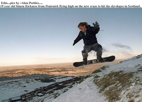 Simon Kirkness from Penicuick flying high snow boarding, January 1996