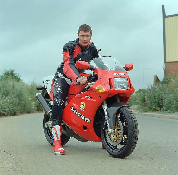 Simon Le Bon from Duran Duran on a Ducati Motobike. It is not clear if this is