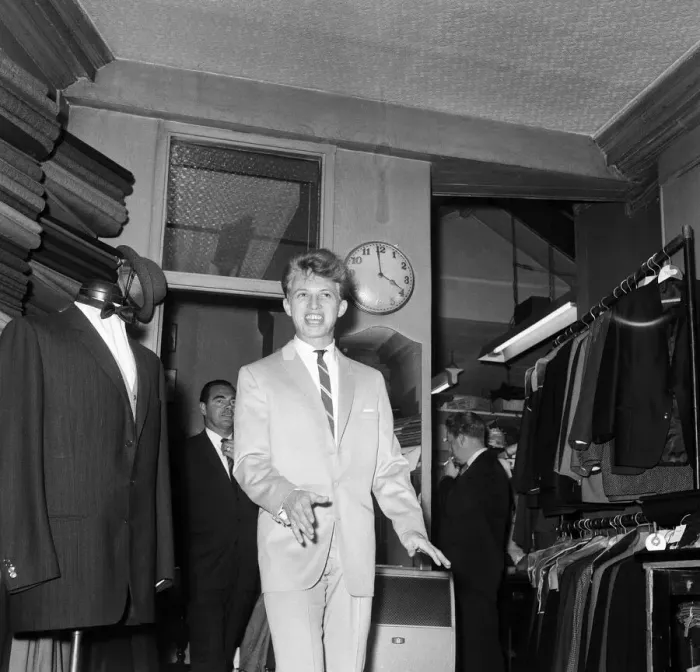 Framed Print : Singer and Actor Tommy Steele tries on his wedding suit. 1960 Framed Print : Singer and Actor Tommy Steele tries on his wedding suit. 1960