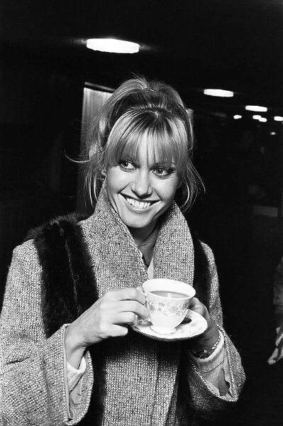 Singer and actress Olivia Newton John at Luton Airport. 28th November 1978