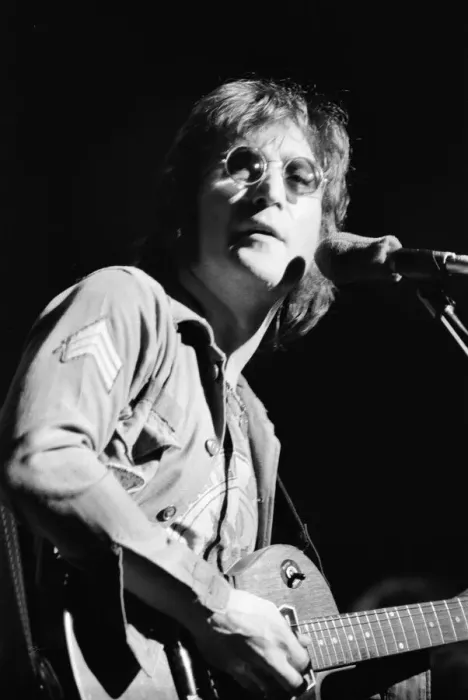 Framed Print : Former singer of The Beatles pop group John Lennon pictured performing on stage during Framed Print : Former singer of The Beatles pop group John Lennon pictured performing on stage during