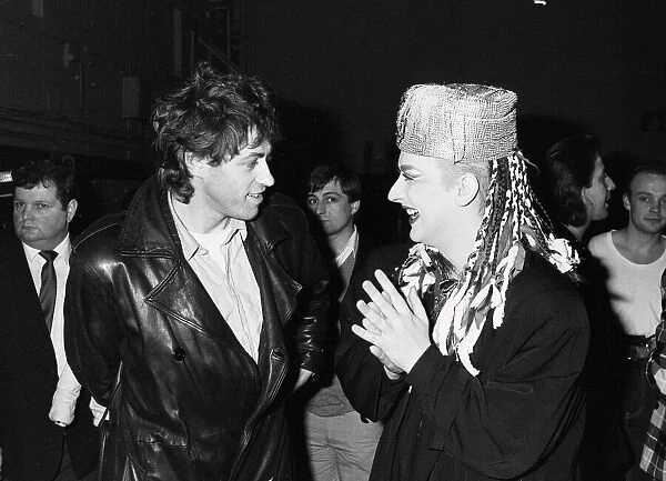 Singer Boy George with Bob Geldof during the Culture Club concert at Wembley